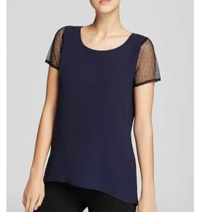 Eileen Fischer silk tunic with sheer lace sleeves.